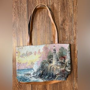 Thomas Kinkade tote. Tapestry design on front. Vegan leather back & bottom.